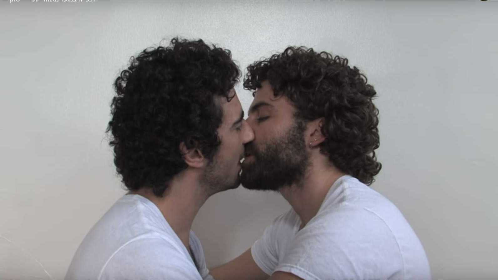 Video art by the artist Idan Biton that is 1:24:24 long and consists of a kiss between two men